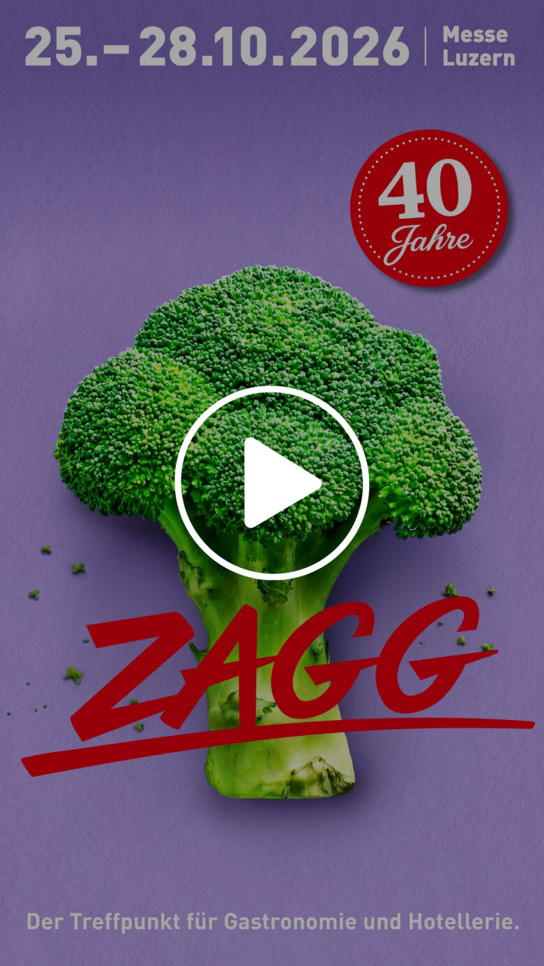 Brokkoli auf violettem Hintergrund mit Veranstaltungsterminen, einem „40 Jahre“-Abzeichen, dem Schriftzug „ZAGG“ in Rot und einer Wiedergabetaste in der Mitte. Der Text erwähnt die Messe Luzern und einen Treffpunkt für Gastronomie und Gastgewerbe.